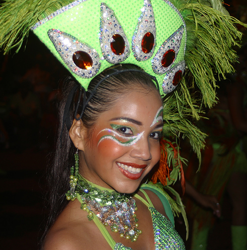 Exotic Barranquilla woman dancing in the streets during Carnival