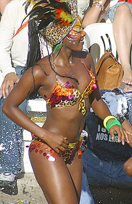 Sexy dark skin Caribbean beauty dancing during Carnival