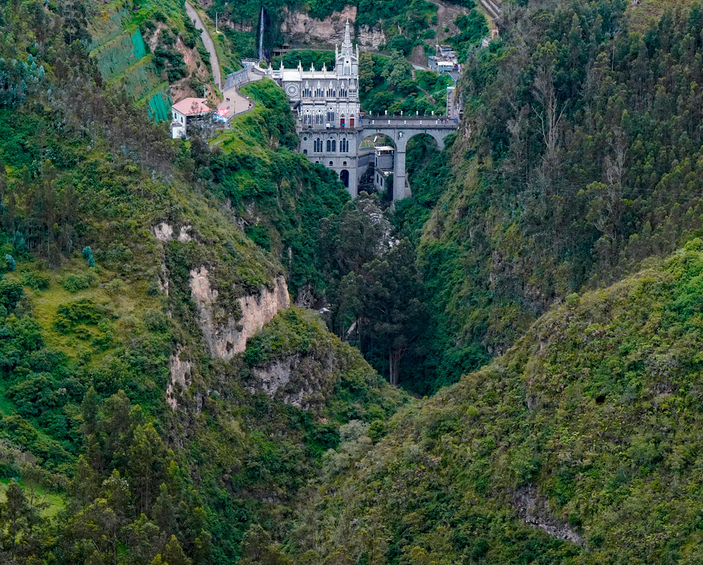 Church above a creek and between two mountain ridges