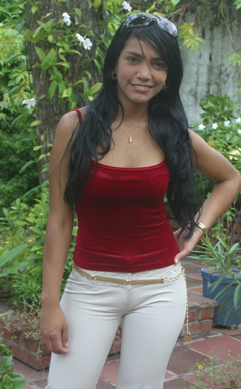 Colombian Woman Red Velvet Top Colombian woman wearing a red velvet top