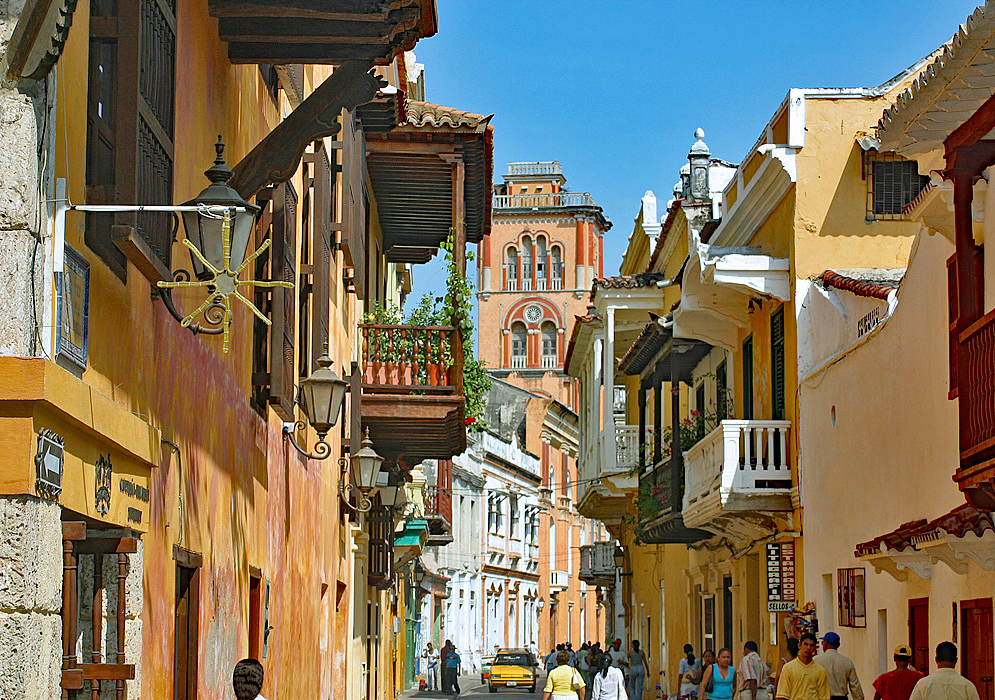 People walking along the narrow old town streets
