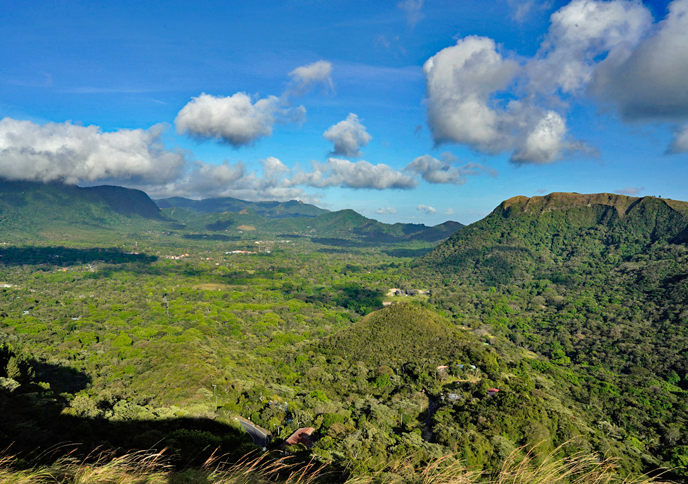 El Valle de Antón Panama Sweeping panorama of El Valle de Antón with green hills and dense tropical forest nestled within an ancient volcanic crater in central Panama