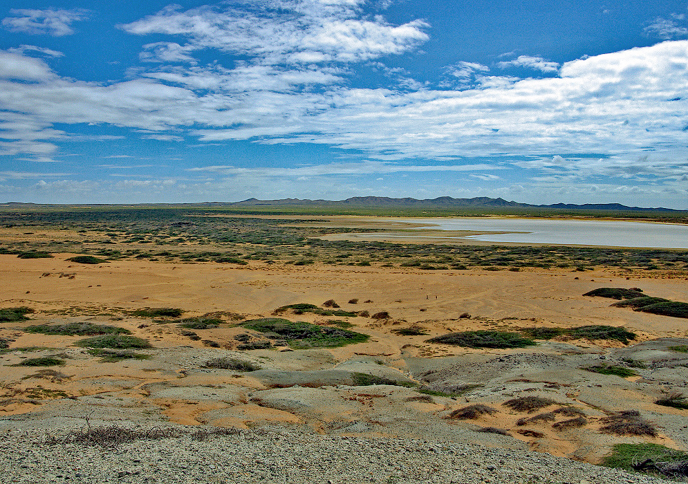 Guajira desert coastline with blue sky and rust color sand