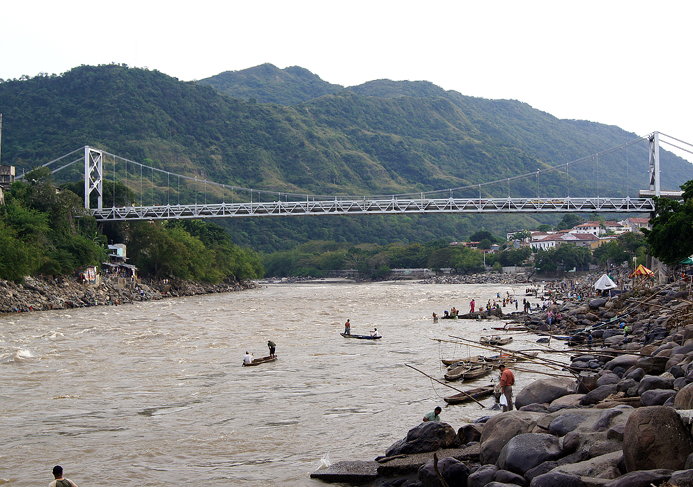 The river Magdalena looking south towards the suspension bride in Honda, Colombia