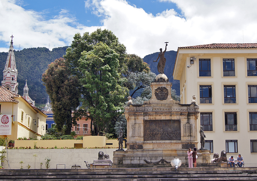 A monument to the battle of Ayacucho in the foreground and the top of the Carmen Church in the background