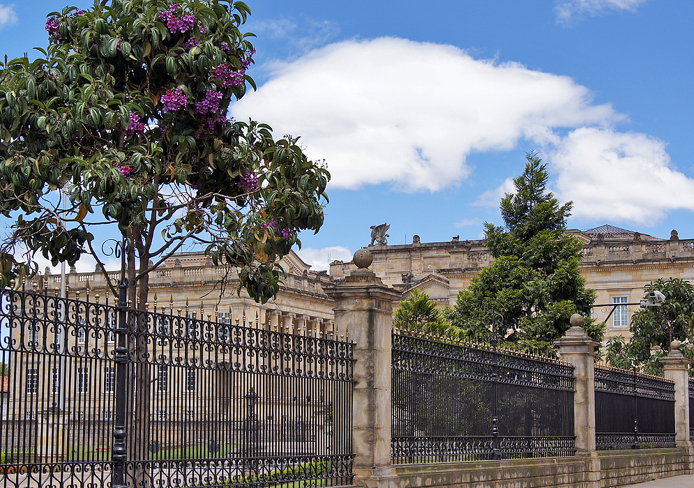 The west side of the Palace of Nariño behind a black fence