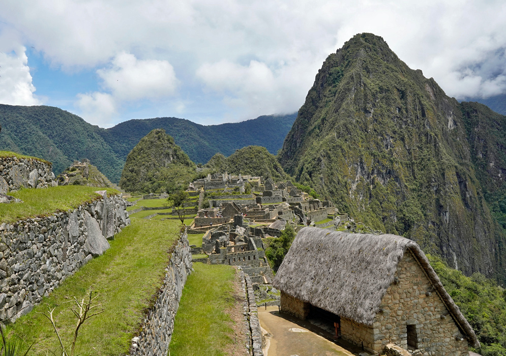 Machu Picchu Ruins Aerial view of Machu Picchu’s central ruins with stone walls, plazas, and temples spread across terraced ridges