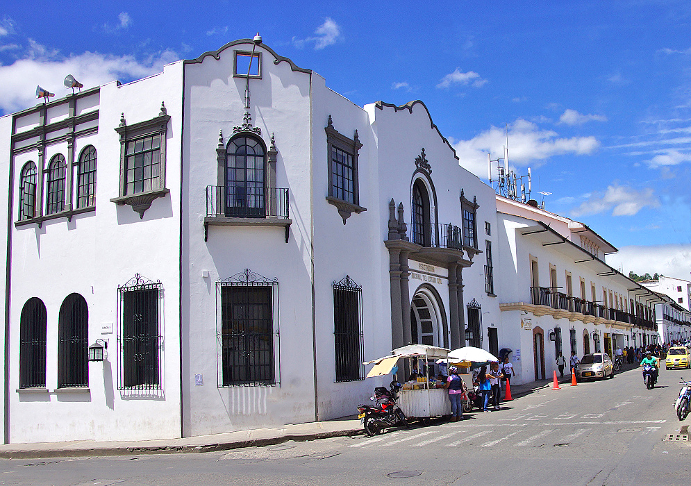 A white corner building in Popayán