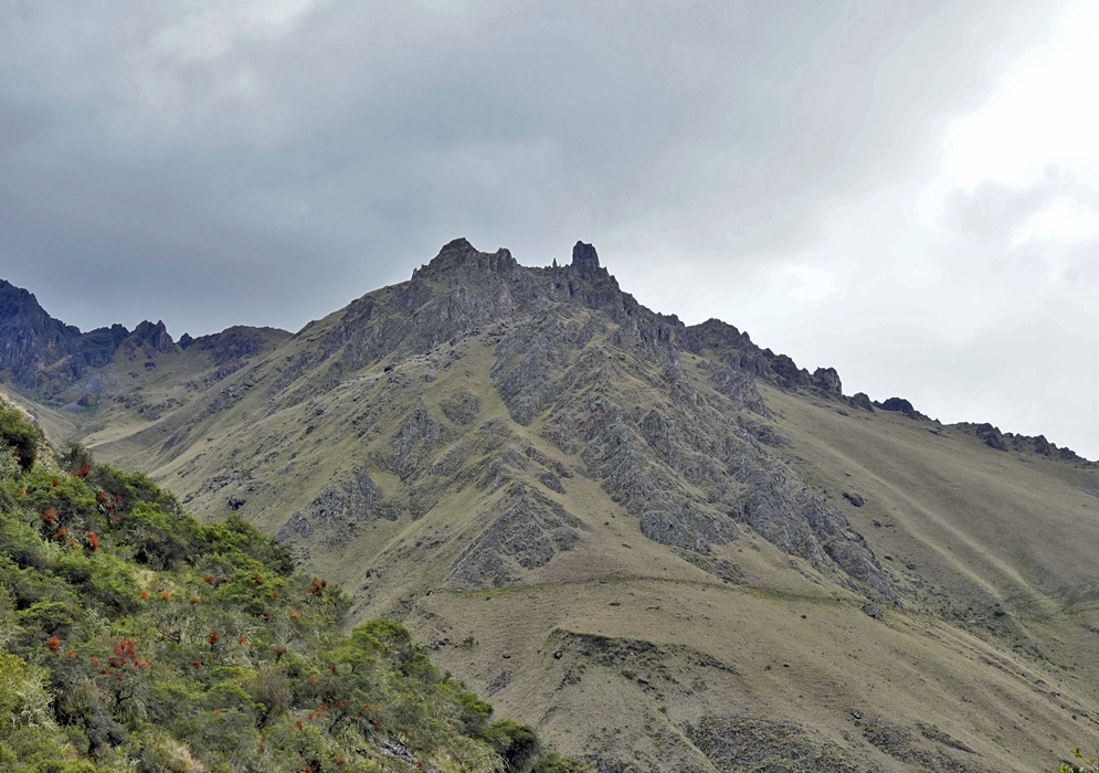 Vilcanota Andes Mountains Rugged mountain peaks with sharp ridges and sparse vegetation mark the edge of the Vilcanota range in the Peruvian Andes